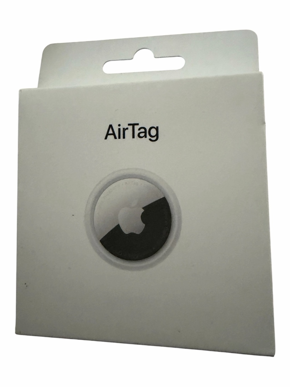 Apple AirTag Tracking Accessory in White and Silver Packaging